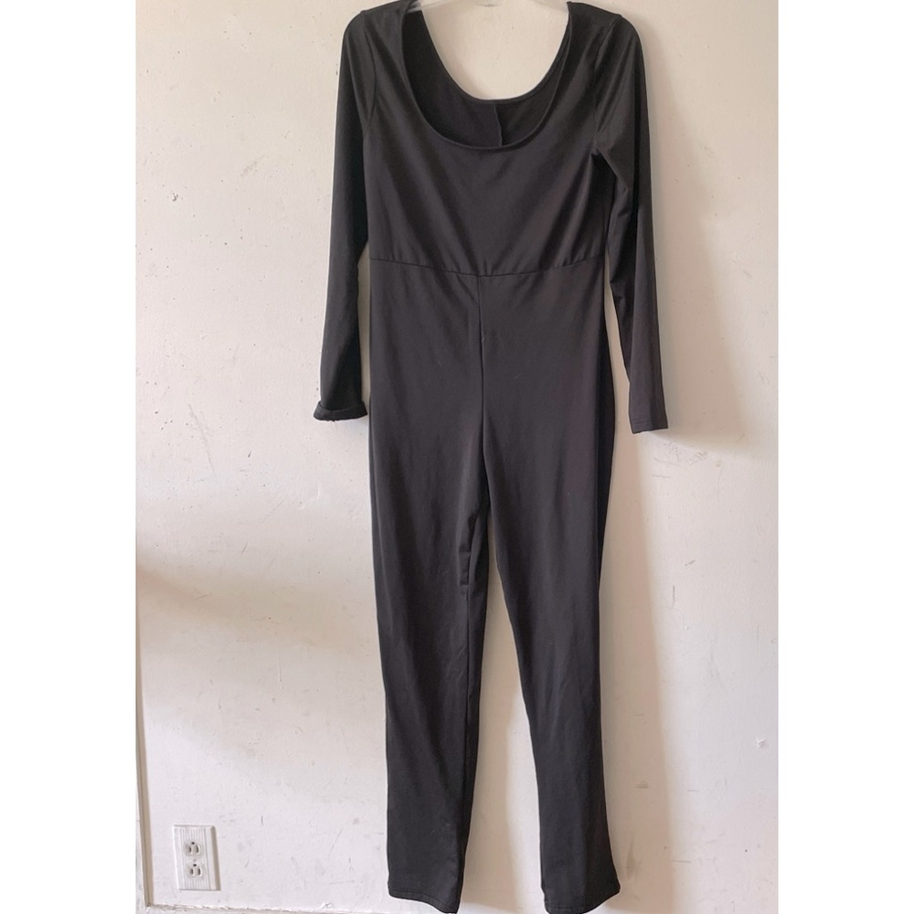 Black jumpsuit .